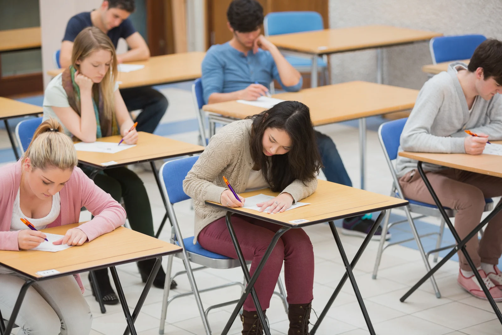 students-sitting-exam-in-hall.jpg
